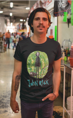 Man wearing black John Rick tee with cartoon-style mashup of John Wick and Rick and Morty characters