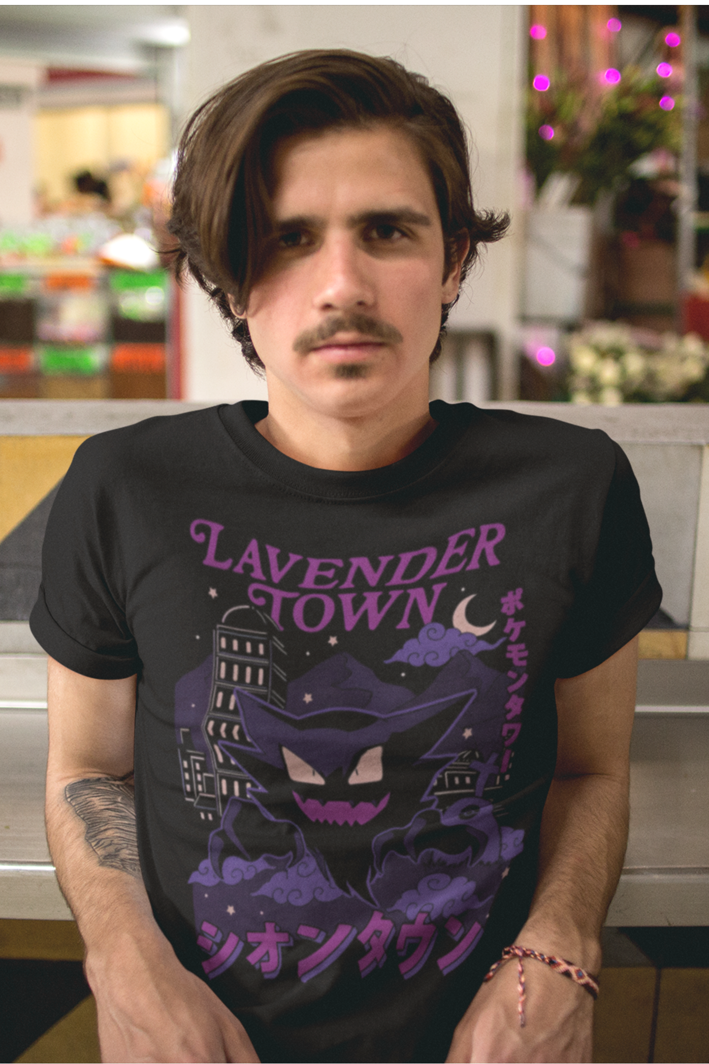 Casual model wearing unisex Lavender Town tee inspired by classic Pokémon game location
