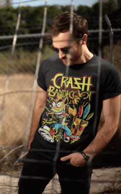 Man posing outdoors wearing a black retro graphic Crash Bandicoot tee.