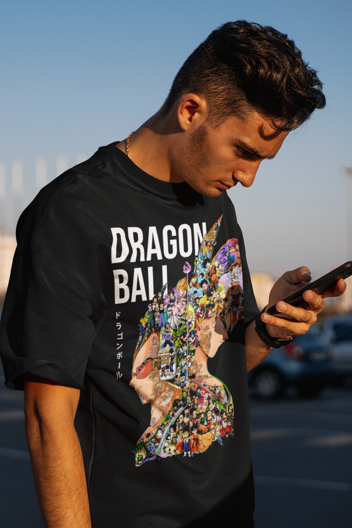 Close-up of Dragon Ball Otaku Mayhem tee showing vibrant Goku and Vegeta profile with many characters