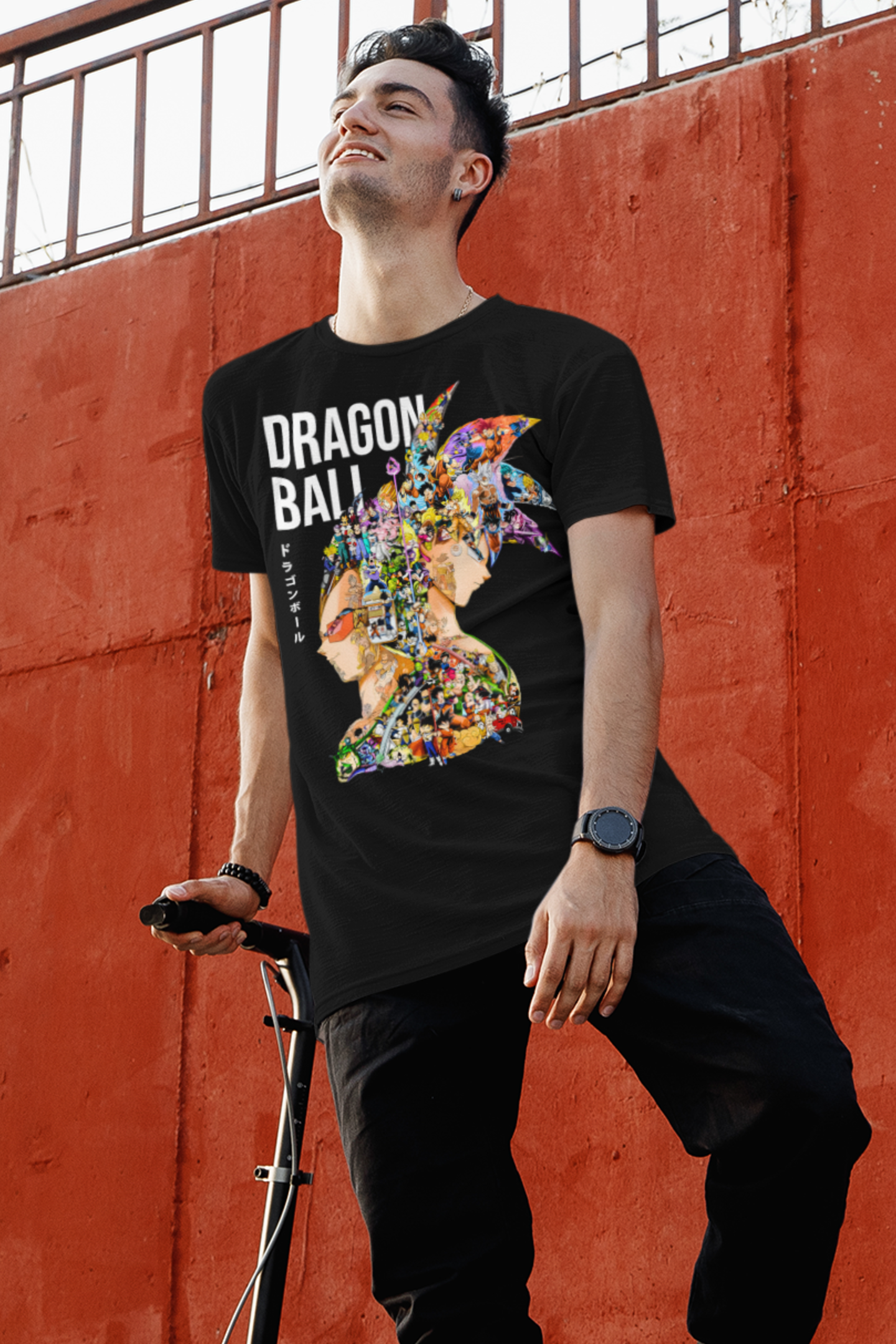 Man wearing black Dragon Ball tee featuring detailed character collage in Goku and Vegeta silhouette