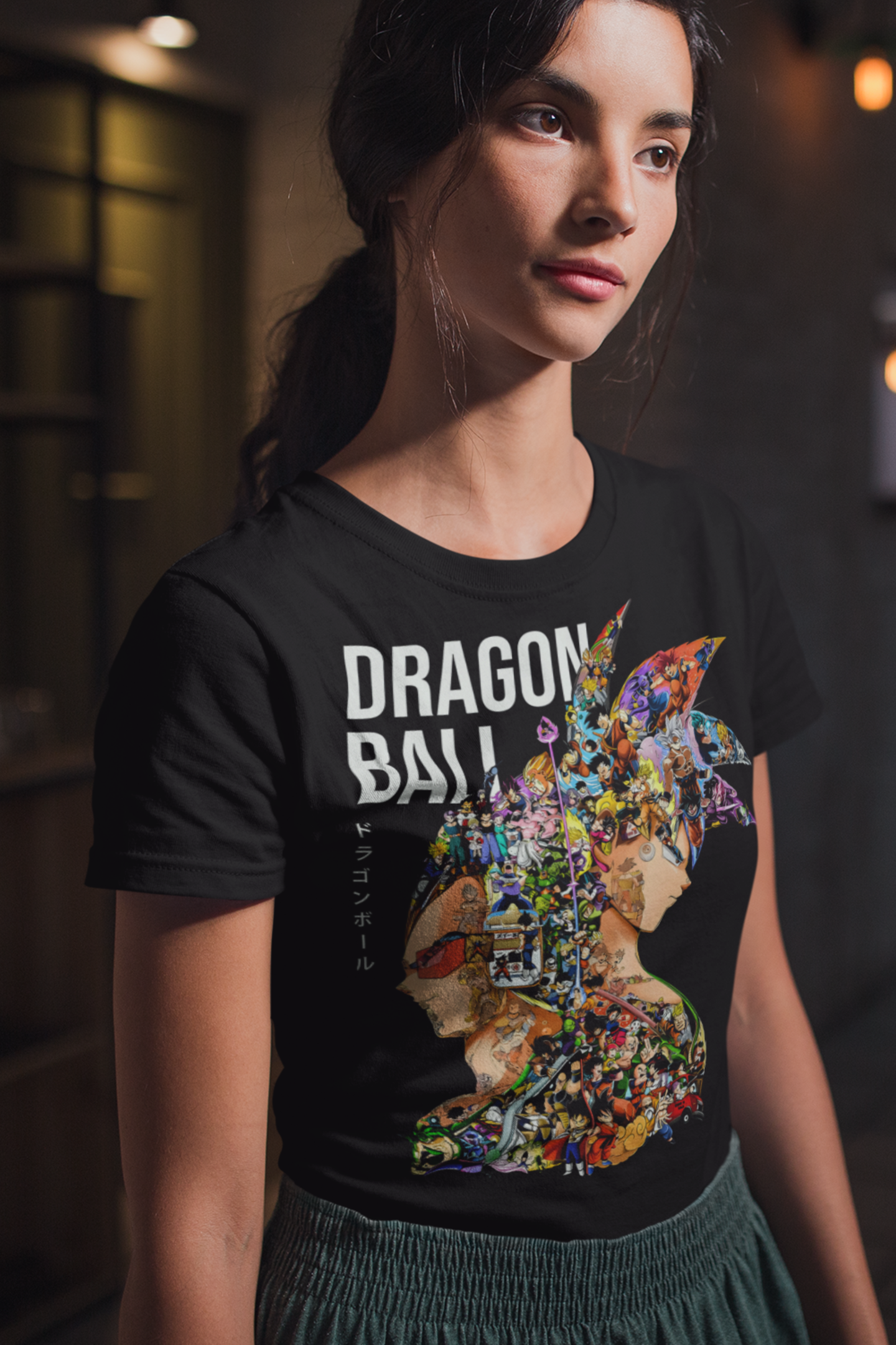 Close-up of Dragon Ball tee design showing multi-character profile artwork of Goku and Vegeta