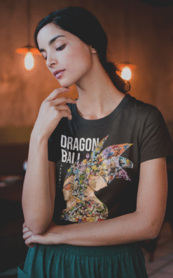 Female model in black Dragon Ball t-shirt featuring colorful montage of iconic Dragon Ball characters